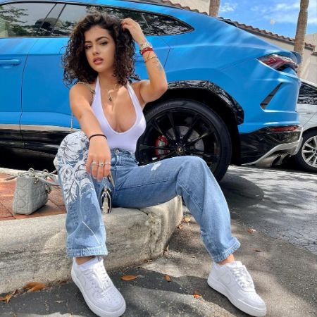 Malu looking beautiful in white -shirt and blue jeans